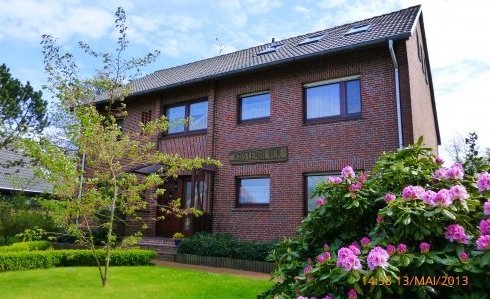 Ferienhaus Küstenblick Wangerooge - Meerblick auf Küste und Wattenmeer